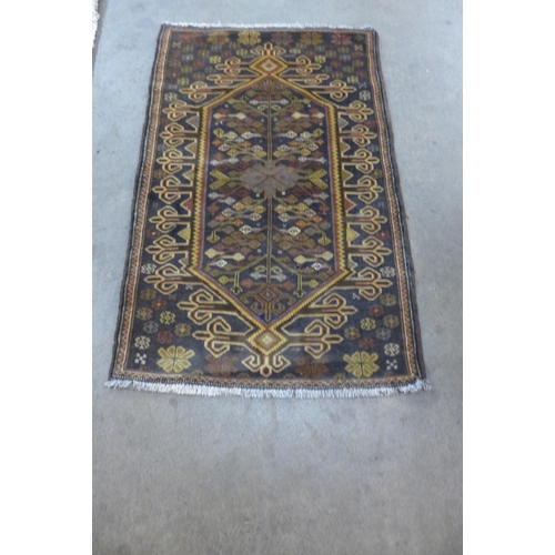 152 - A Pakastani blue ground prayer rug, 119 x 92cms