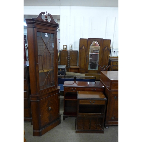 154 - A mahogany freestanding corner cabinet and two bookcases