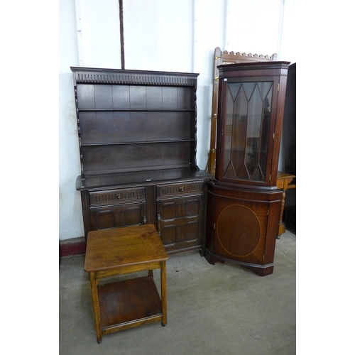 155 - An oak dresser, a mahogany corner cabinet, etc.