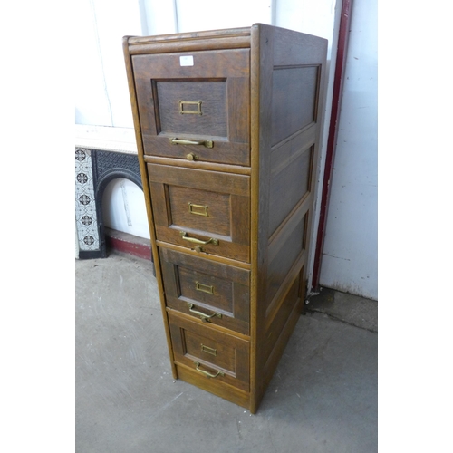 158 - An early 20th Century oak four drawer filing cabinet