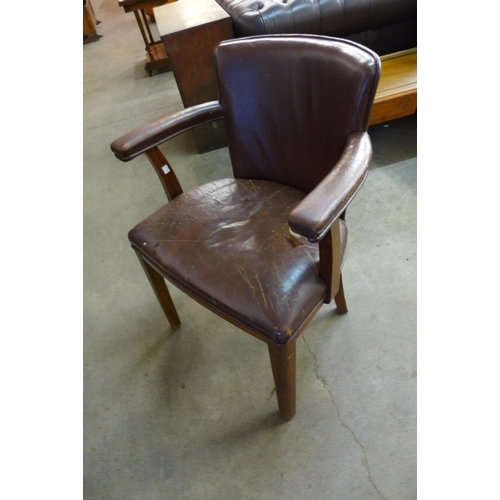 159 - An early 20th Century mahogany and brown leather desk chair