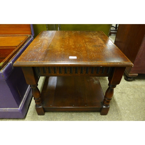 163 - A square oak coffee table