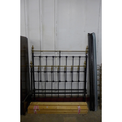 167 - A Victorian brass and wrought iron double bed