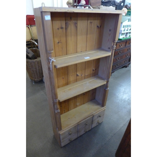 179 - A pine wall hanging bookcase