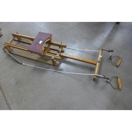 184 - An early 20th Century beech rowing machine