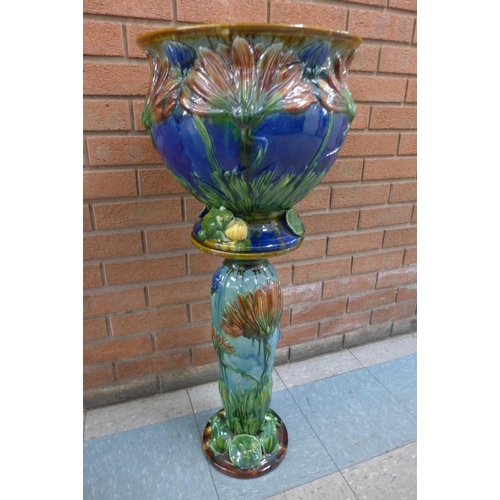 191 - An Art Nouveau style majolica porcelain jardiniere and stand