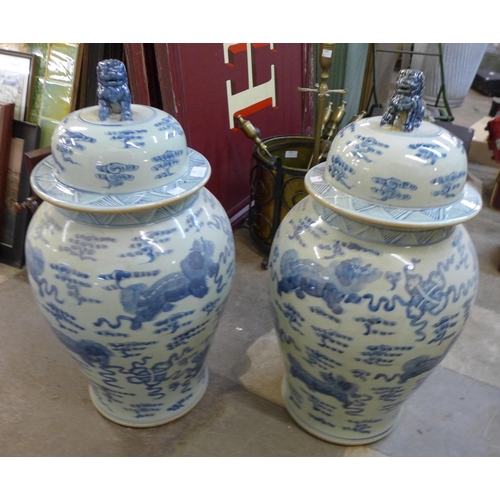 192 - A pair of large Chinese blue and white porcelain jars and covers