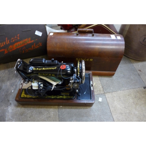 198 - An oak cased Singer sewing machine