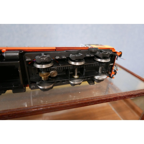 215 - An O scale hand-built class British Railways 58 diesel locomotive on plinth in glass case. The model... 