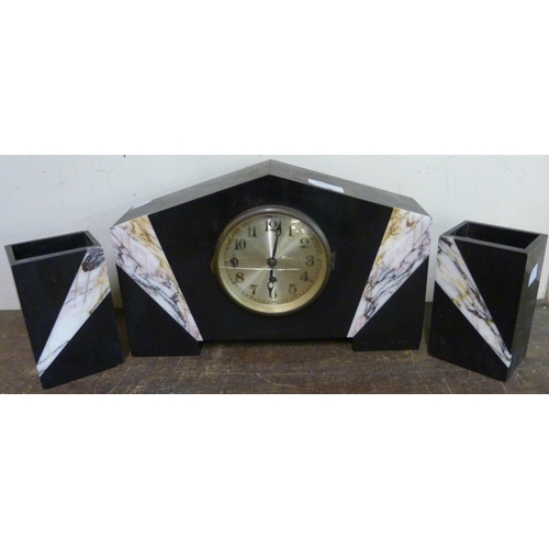 272 - A French Art Deco black slate and marble clock garniture