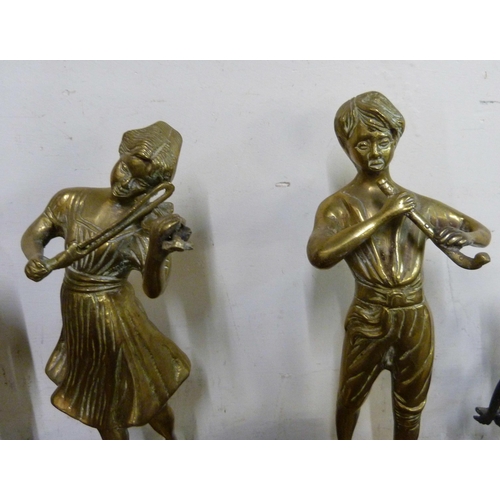 274 - A pair of brass figures of musicians on wooden bases and two other figures of a lady and a knight