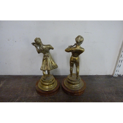 274 - A pair of brass figures of musicians on wooden bases and two other figures of a lady and a knight