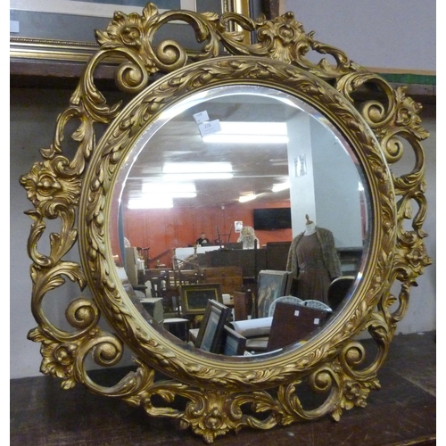 278 - A circular gilt framed mirror