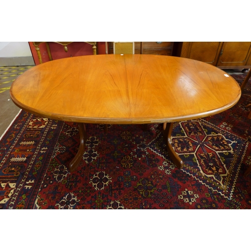 28 - A G-Plan Fresco teak oval extending dining table and four chairs