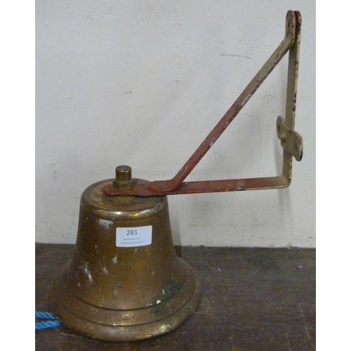 281 - A brass fireman's bell on bracket