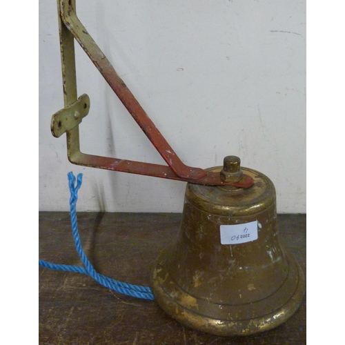 281 - A brass fireman's bell on bracket