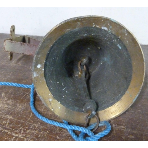 281 - A brass fireman's bell on bracket