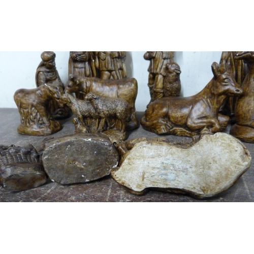 282 - A painted composite Nativity set