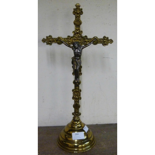 284 - A French brass tabletop crucifix