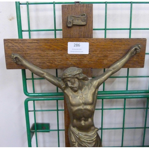 286 - A French oak and brass wall hanging crucifix