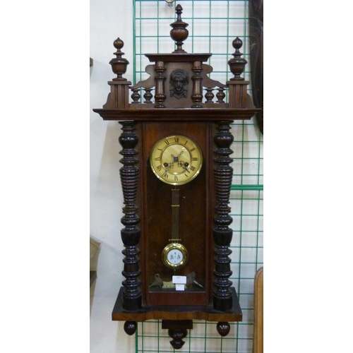 287 - A 19th Century walnut Vienna wall clock