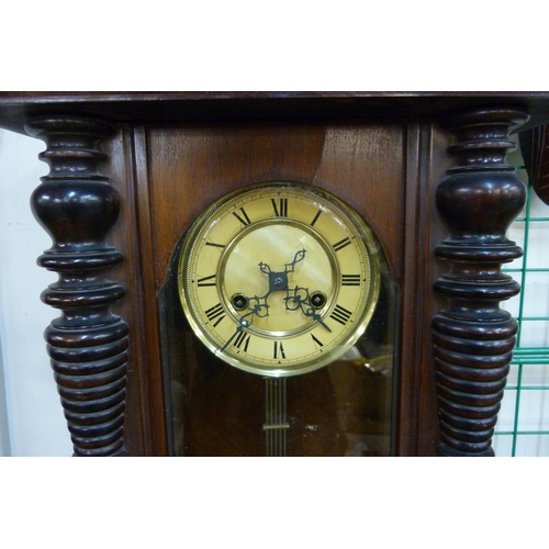 287 - A 19th Century walnut Vienna wall clock