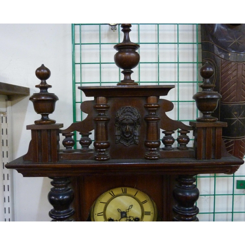 287 - A 19th Century walnut Vienna wall clock