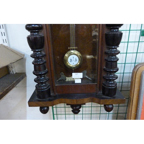 287 - A 19th Century walnut Vienna wall clock