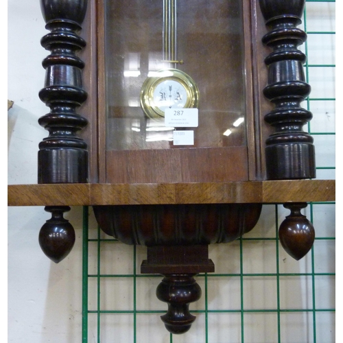 287 - A 19th Century walnut Vienna wall clock