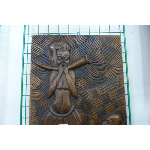 290 - Two African carved wooden plaques