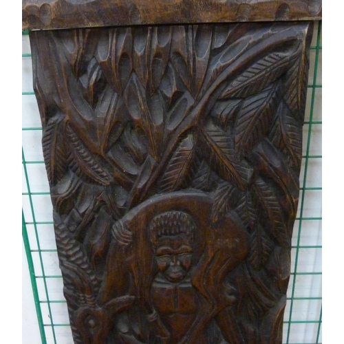 290 - Two African carved wooden plaques