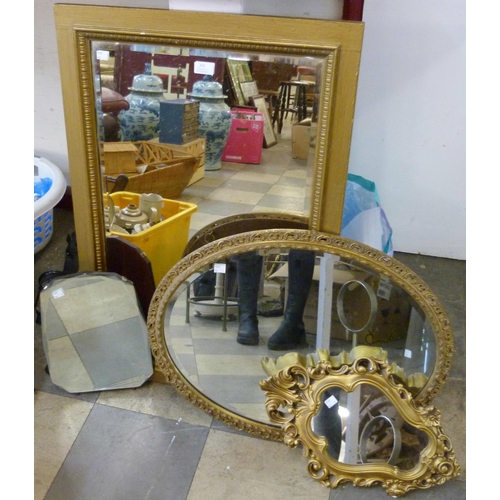 302 - Three gilt framed mirrors and one other