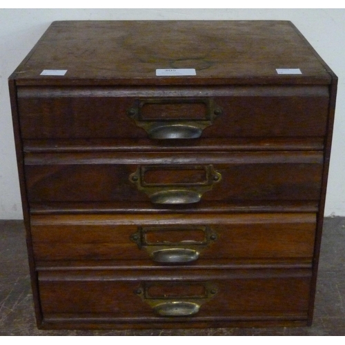 305 - An early 20th Century mahogany four drawer table top chest