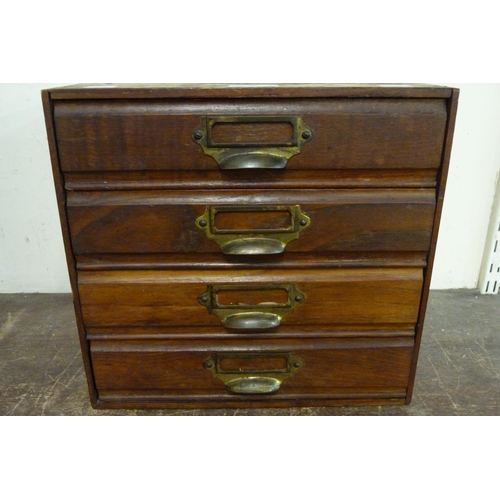 305 - An early 20th Century mahogany four drawer table top chest