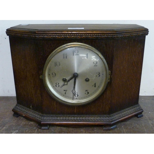 309 - An early 20th Century oak mantel clock