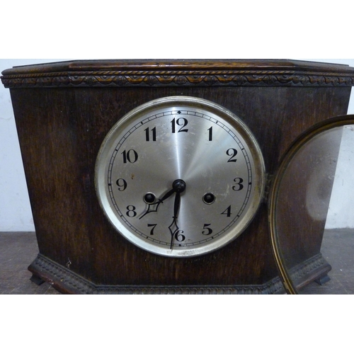 309 - An early 20th Century oak mantel clock