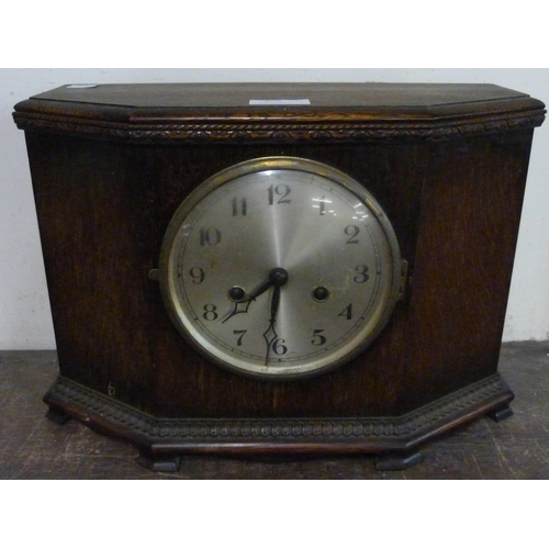 309 - An early 20th Century oak mantel clock