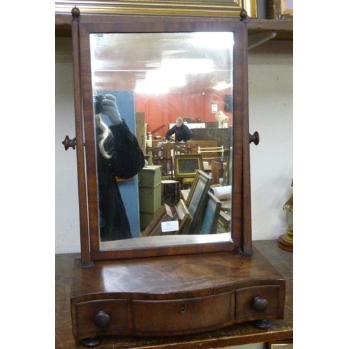 313 - A George III mahogany toilet mirror