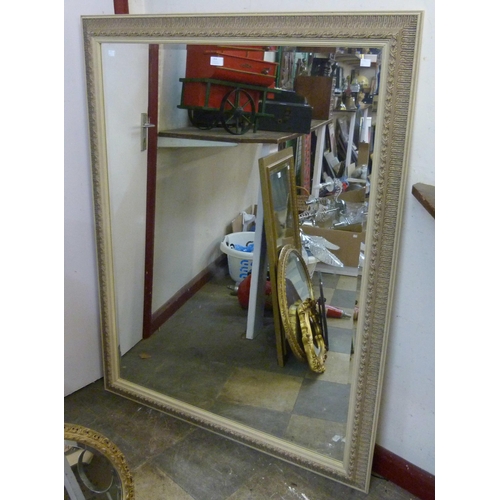 314 - A large French style cream framed mirror