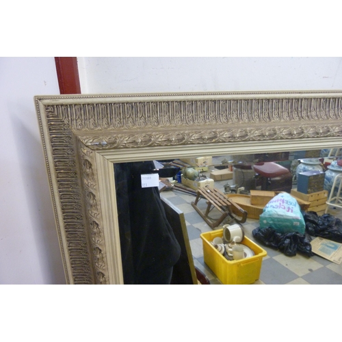 314 - A large French style cream framed mirror