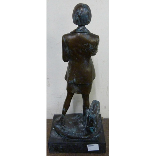 316 - A bronze figure of an office worker, on black marble socle