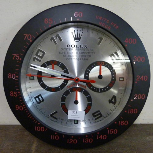 318 - A Rolex style dealer's display wall clock