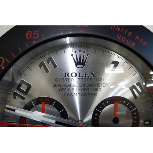 318 - A Rolex style dealer's display wall clock