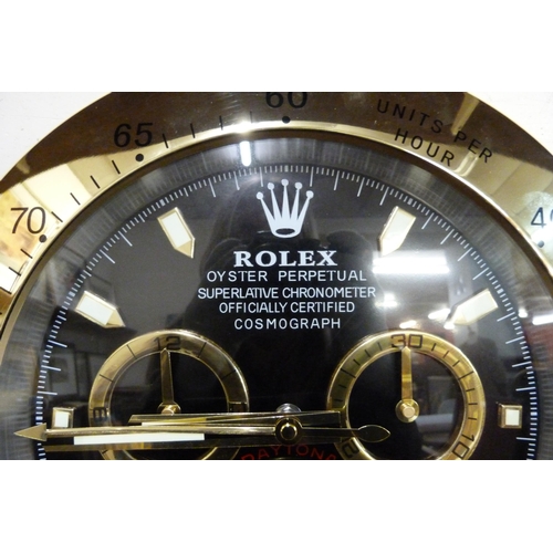 320 - A Rolex style dealer's display wall clock