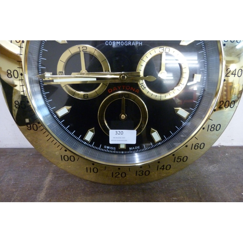 320 - A Rolex style dealer's display wall clock