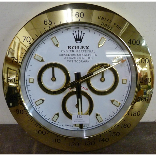 322 - A Rolex style dealer's display wall clock