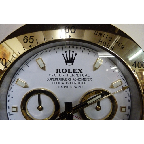 322 - A Rolex style dealer's display wall clock