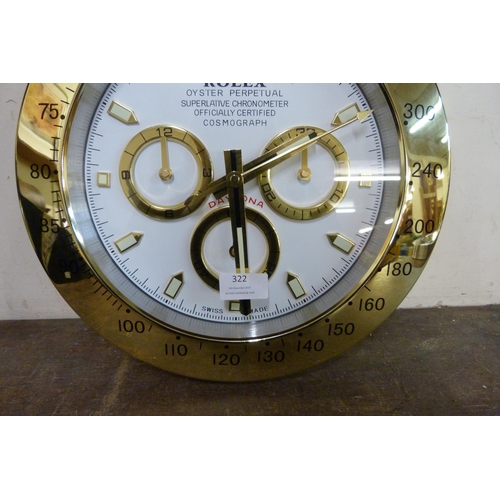 322 - A Rolex style dealer's display wall clock