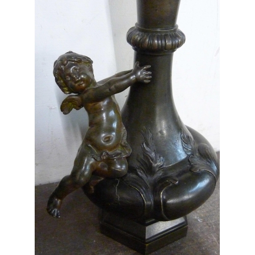 327 - A pair of French style bronze cherub vases