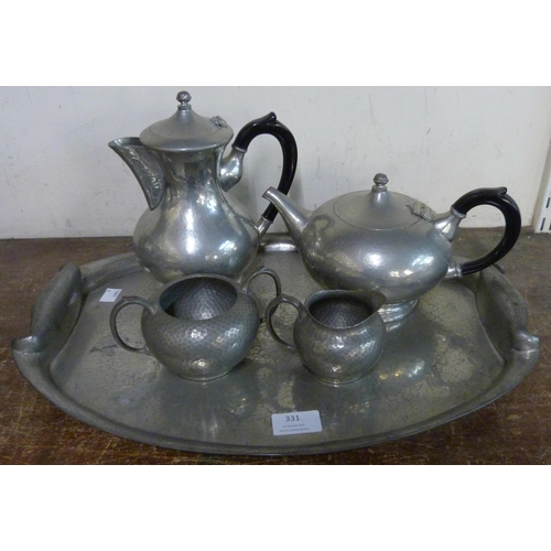 331 - An Arts and Crafts pewter coffee set with tray